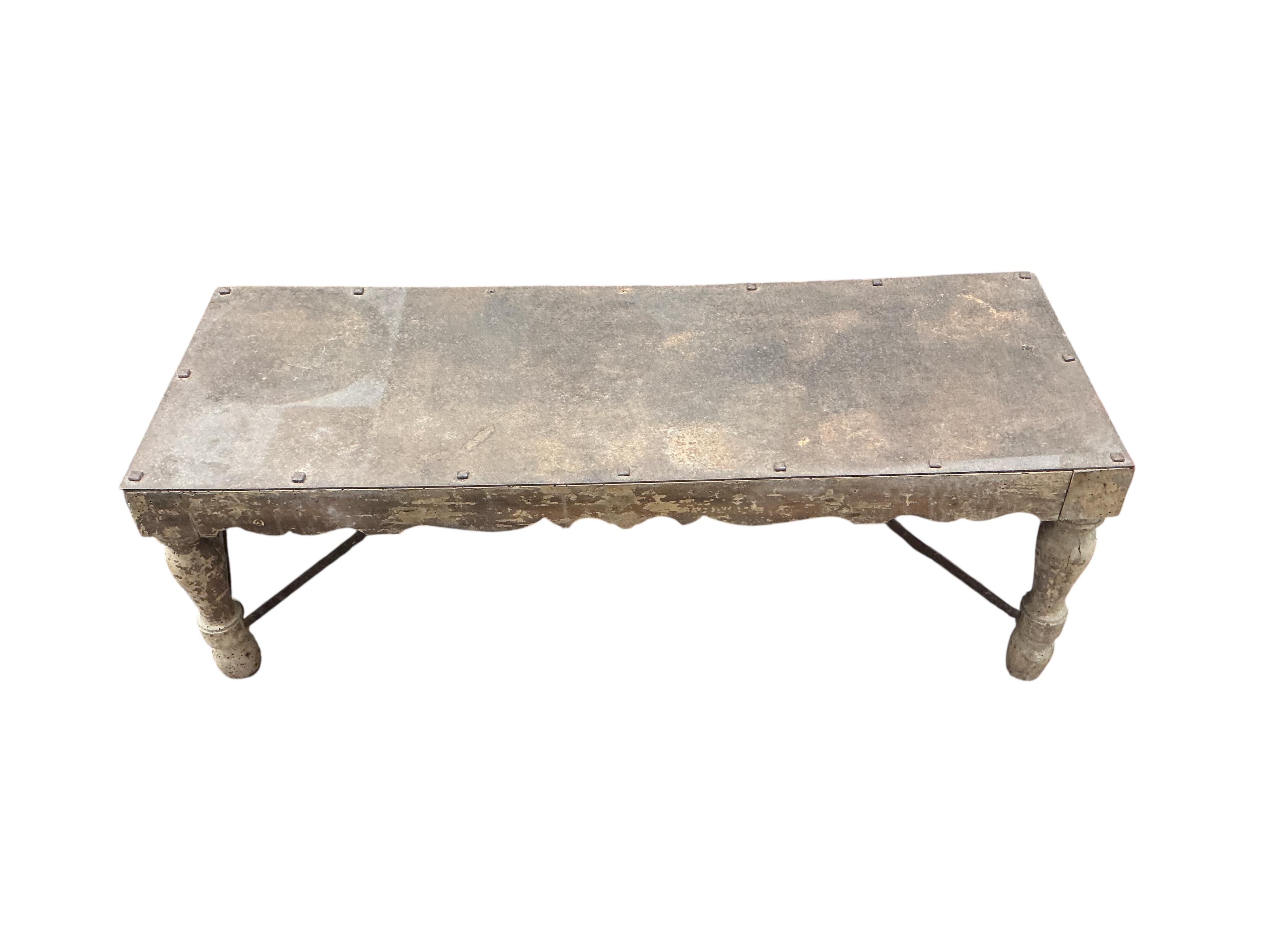 A rectangular bleached wood coffee table with studded iron top, width 130cm, depth 46cm, height 46cm